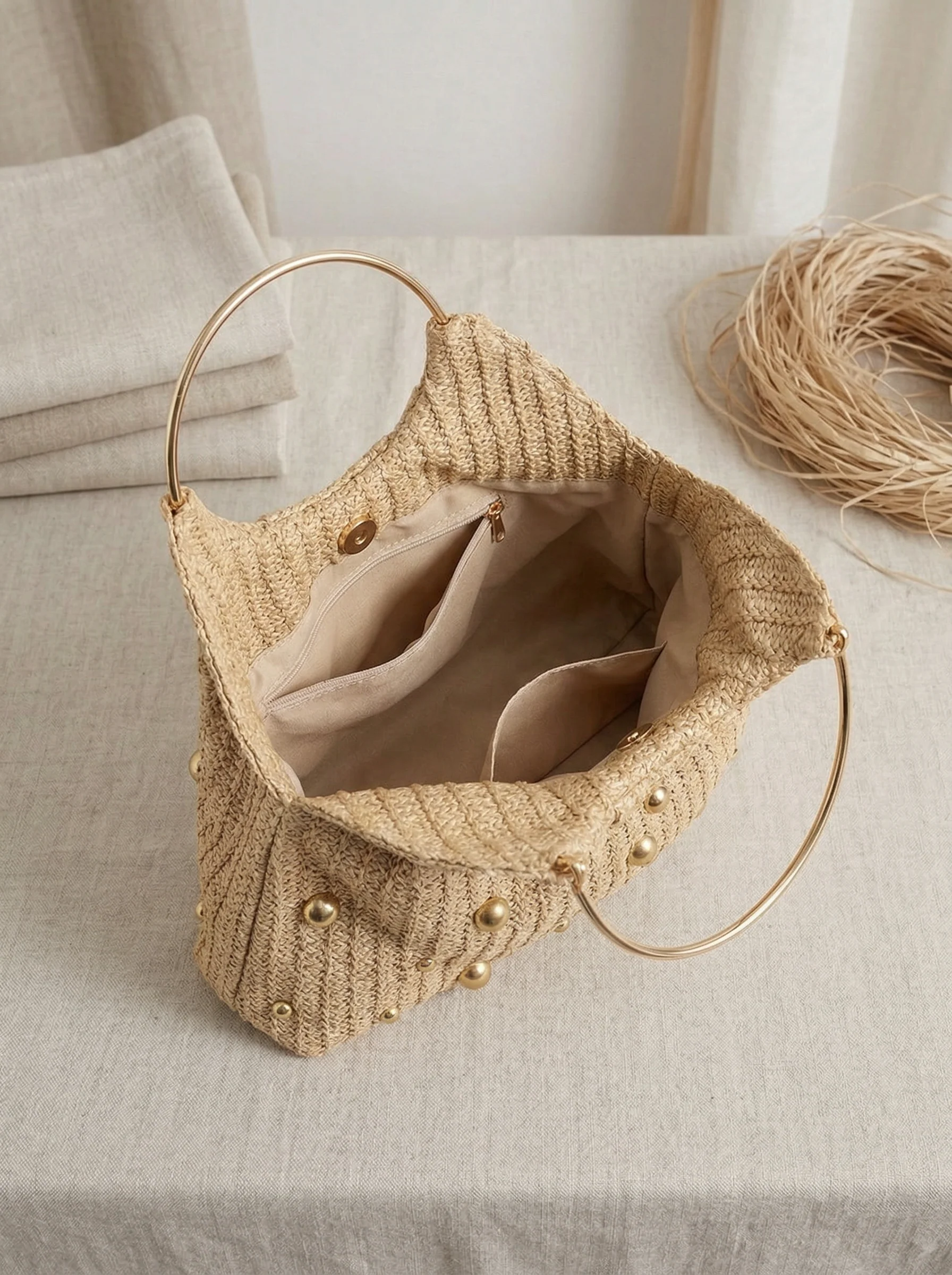 Artisanal Studded Handwoven Raffia Bag with Sculptural Gold Ring Handle - Image 3